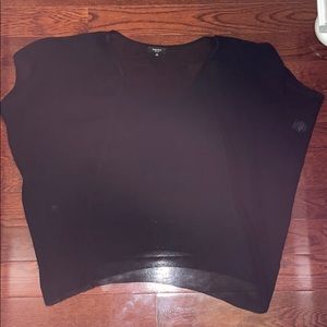 Loose see-through silk shirt.